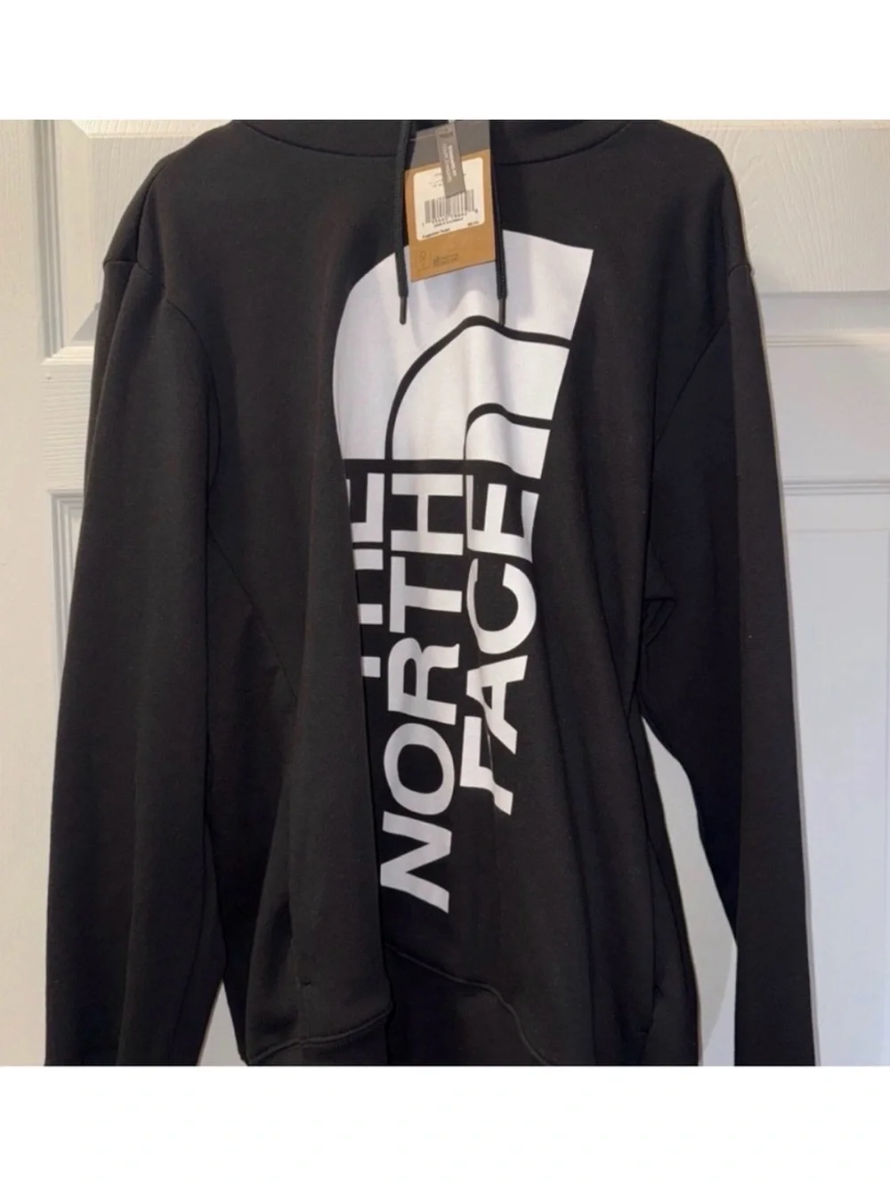 The North Face Men’s Black Hoodie with White Vertical Logo